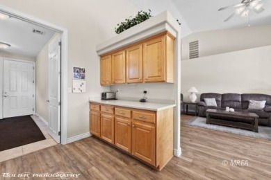 This spacious townhome is gorgeous and ideally positioned in on Wolf Creek At Paradise Canyon in Nevada - for sale on GolfHomes.com, golf home, golf lot