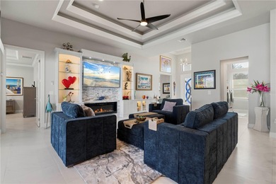 SHOWCASE HOME W/A WATER VIEW IN PGI! Check out this exceptional on Saint Andrews South Golf Club in Florida - for sale on GolfHomes.com, golf home, golf lot