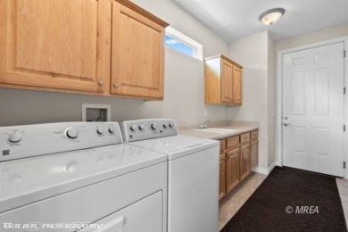 This spacious townhome is gorgeous and ideally positioned in on Wolf Creek At Paradise Canyon in Nevada - for sale on GolfHomes.com, golf home, golf lot
