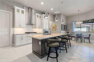 SHOWCASE HOME W/A WATER VIEW IN PGI! Check out this exceptional on Saint Andrews South Golf Club in Florida - for sale on GolfHomes.com, golf home, golf lot