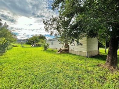 Two-bed, two-bath home situated on three spacious lots in the on Links At Lands End in Texas - for sale on GolfHomes.com, golf home, golf lot