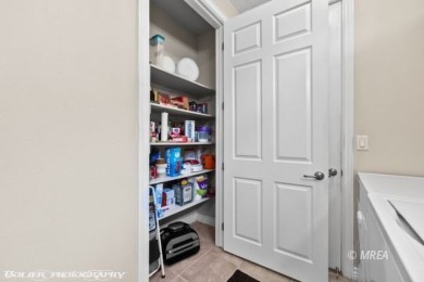 This spacious townhome is gorgeous and ideally positioned in on Wolf Creek At Paradise Canyon in Nevada - for sale on GolfHomes.com, golf home, golf lot
