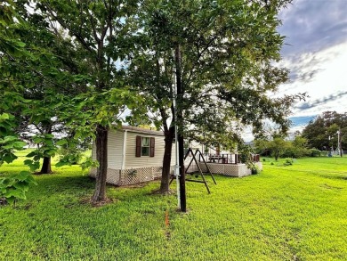 Two-bed, two-bath home situated on three spacious lots in the on Links At Lands End in Texas - for sale on GolfHomes.com, golf home, golf lot