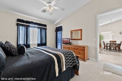 This spacious townhome is gorgeous and ideally positioned in on Wolf Creek At Paradise Canyon in Nevada - for sale on GolfHomes.com, golf home, golf lot