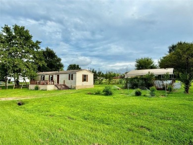 Two-bed, two-bath home situated on three spacious lots in the on Links At Lands End in Texas - for sale on GolfHomes.com, golf home, golf lot