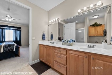 This spacious townhome is gorgeous and ideally positioned in on Wolf Creek At Paradise Canyon in Nevada - for sale on GolfHomes.com, golf home, golf lot