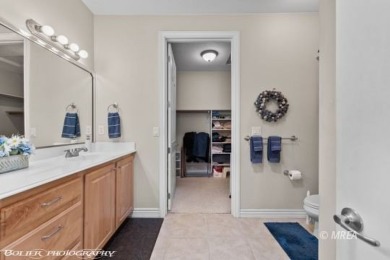 This spacious townhome is gorgeous and ideally positioned in on Wolf Creek At Paradise Canyon in Nevada - for sale on GolfHomes.com, golf home, golf lot