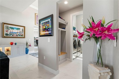 SHOWCASE HOME W/A WATER VIEW IN PGI! Check out this exceptional on Saint Andrews South Golf Club in Florida - for sale on GolfHomes.com, golf home, golf lot