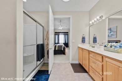 This spacious townhome is gorgeous and ideally positioned in on Wolf Creek At Paradise Canyon in Nevada - for sale on GolfHomes.com, golf home, golf lot