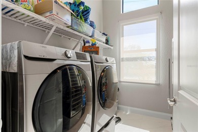 SHOWCASE HOME W/A WATER VIEW IN PGI! Check out this exceptional on Saint Andrews South Golf Club in Florida - for sale on GolfHomes.com, golf home, golf lot