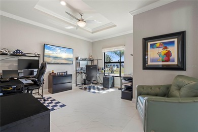 SHOWCASE HOME W/A WATER VIEW IN PGI! Check out this exceptional on Saint Andrews South Golf Club in Florida - for sale on GolfHomes.com, golf home, golf lot