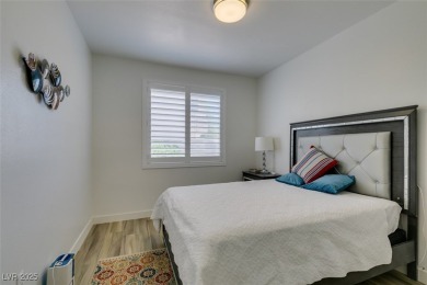 Beautifully upgraded 3-bed, 3-bath home in the guard-gated on Rhodes Ranch Golf Club in Nevada - for sale on GolfHomes.com, golf home, golf lot