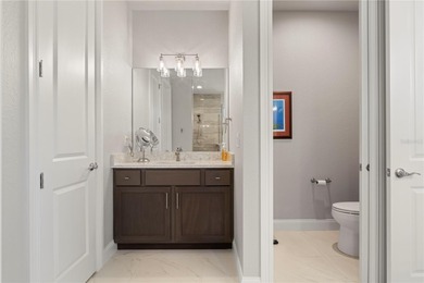 SHOWCASE HOME W/A WATER VIEW IN PGI! Check out this exceptional on Saint Andrews South Golf Club in Florida - for sale on GolfHomes.com, golf home, golf lot