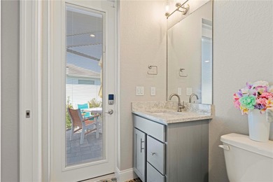 SHOWCASE HOME W/A WATER VIEW IN PGI! Check out this exceptional on Saint Andrews South Golf Club in Florida - for sale on GolfHomes.com, golf home, golf lot