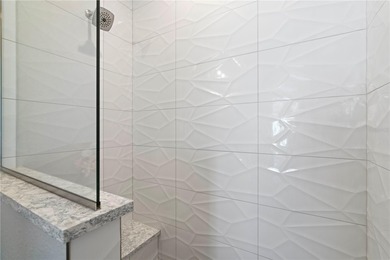 SHOWCASE HOME W/A WATER VIEW IN PGI! Check out this exceptional on Saint Andrews South Golf Club in Florida - for sale on GolfHomes.com, golf home, golf lot