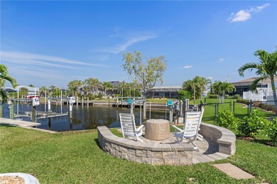 SHOWCASE HOME W/A WATER VIEW IN PGI! Check out this exceptional on Saint Andrews South Golf Club in Florida - for sale on GolfHomes.com, golf home, golf lot