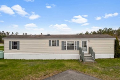 Easy living in this beautiful and bright mobile home in a on The Links At Outlook in Maine - for sale on GolfHomes.com, golf home, golf lot
