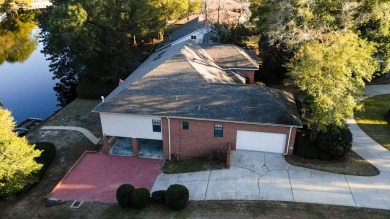 Beautiful lakefront home positioned in a peaceful and on Rocky Bayou Country Club in Florida - for sale on GolfHomes.com, golf home, golf lot