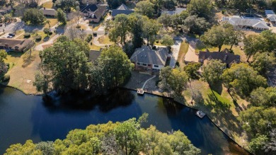 Beautiful lakefront home positioned in a peaceful and on Rocky Bayou Country Club in Florida - for sale on GolfHomes.com, golf home, golf lot