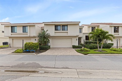 Welcome to waterfront living at Playa Escondida, where you will on Isla Del Sol Yacht and Country Club in Florida - for sale on GolfHomes.com, golf home, golf lot