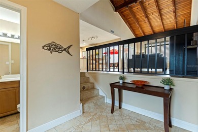 Welcome to waterfront living at Playa Escondida, where you will on Isla Del Sol Yacht and Country Club in Florida - for sale on GolfHomes.com, golf home, golf lot