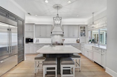 **STUNNINGLY DESIGNED and UPDATED -- ARCHITECTURAL ESTATE in the on The Oaks Club in Florida - for sale on GolfHomes.com, golf home, golf lot