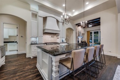 BREATHTAKING 5-BEDROOM CUSTOM ESTATE crafted by renowned builder on The Tribute At the Colony in Texas - for sale on GolfHomes.com, golf home, golf lot