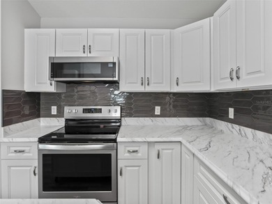 One or more photo(s) has been virtually staged. NO YARD WORK! on Stonecrest Golf and Club Club in Florida - for sale on GolfHomes.com, golf home, golf lot