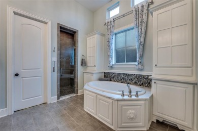BREATHTAKING 5-BEDROOM CUSTOM ESTATE crafted by renowned builder on The Tribute At the Colony in Texas - for sale on GolfHomes.com, golf home, golf lot