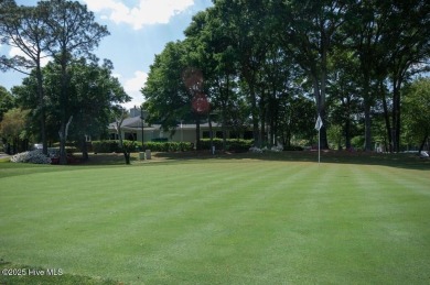 Here is your future home site in the active and amenity-rich on Sea Trail Golf Resort in North Carolina - for sale on GolfHomes.com, golf home, golf lot