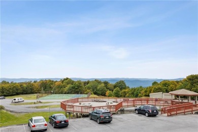 Enjoy LONG RANGE VIEWS from this VERY AFFORDABLE turnkey unit on Beech Mountain Club in North Carolina - for sale on GolfHomes.com, golf home, golf lot