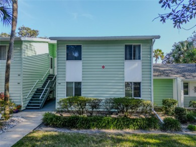 Welcome to this charming first-floor unit in a desirable 55+ on Country Club At Silver Springs Shores in Florida - for sale on GolfHomes.com, golf home, golf lot