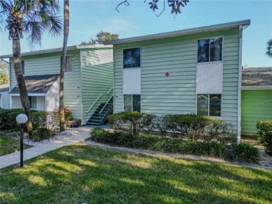 Welcome to this charming first-floor unit in a desirable 55+ on Country Club At Silver Springs Shores in Florida - for sale on GolfHomes.com, golf home, golf lot