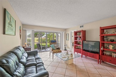 Schedule to See This Spacious 3-Bedroom/2-Bath Unit in the on  in Florida - for sale on GolfHomes.com, golf home, golf lot