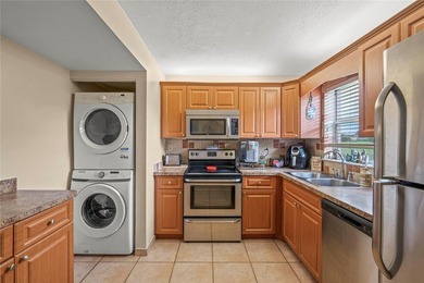 Schedule to See This Spacious 3-Bedroom/2-Bath Unit in the on  in Florida - for sale on GolfHomes.com, golf home, golf lot