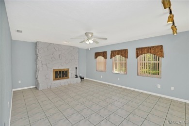 Long driveway and a majestic oak tree lead to this 3 bedroom 2 on Sugarmill Woods Golf and Country Club in Florida - for sale on GolfHomes.com, golf home, golf lot