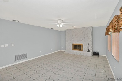 Long driveway and a majestic oak tree lead to this 3 bedroom 2 on Sugarmill Woods Golf and Country Club in Florida - for sale on GolfHomes.com, golf home, golf lot