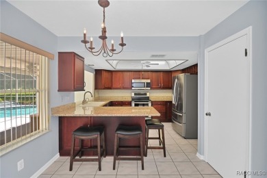 Long driveway and a majestic oak tree lead to this 3 bedroom 2 on Sugarmill Woods Golf and Country Club in Florida - for sale on GolfHomes.com, golf home, golf lot