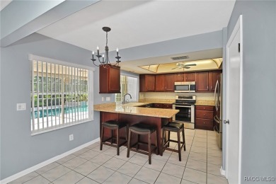 Long driveway and a majestic oak tree lead to this 3 bedroom 2 on Sugarmill Woods Golf and Country Club in Florida - for sale on GolfHomes.com, golf home, golf lot