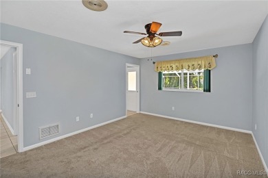 Long driveway and a majestic oak tree lead to this 3 bedroom 2 on Sugarmill Woods Golf and Country Club in Florida - for sale on GolfHomes.com, golf home, golf lot
