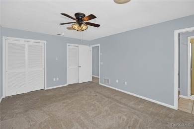Long driveway and a majestic oak tree lead to this 3 bedroom 2 on Sugarmill Woods Golf and Country Club in Florida - for sale on GolfHomes.com, golf home, golf lot