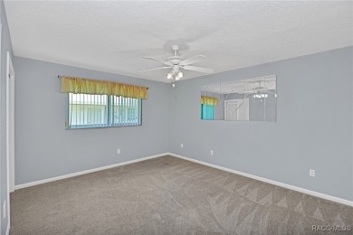 Long driveway and a majestic oak tree lead to this 3 bedroom 2 on Sugarmill Woods Golf and Country Club in Florida - for sale on GolfHomes.com, golf home, golf lot