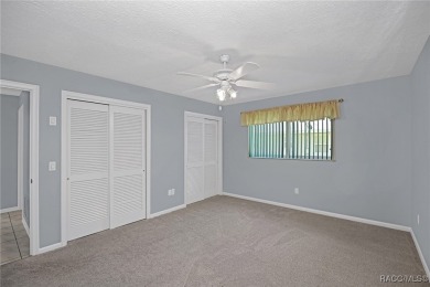 Long driveway and a majestic oak tree lead to this 3 bedroom 2 on Sugarmill Woods Golf and Country Club in Florida - for sale on GolfHomes.com, golf home, golf lot