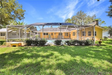 Long driveway and a majestic oak tree lead to this 3 bedroom 2 on Sugarmill Woods Golf and Country Club in Florida - for sale on GolfHomes.com, golf home, golf lot