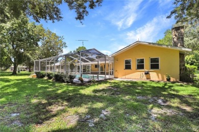 Long driveway and a majestic oak tree lead to this 3 bedroom 2 on Sugarmill Woods Golf and Country Club in Florida - for sale on GolfHomes.com, golf home, golf lot
