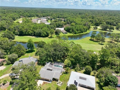 Long driveway and a majestic oak tree lead to this 3 bedroom 2 on Sugarmill Woods Golf and Country Club in Florida - for sale on GolfHomes.com, golf home, golf lot