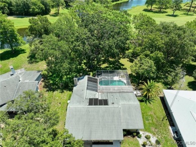 Long driveway and a majestic oak tree lead to this 3 bedroom 2 on Sugarmill Woods Golf and Country Club in Florida - for sale on GolfHomes.com, golf home, golf lot
