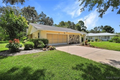 Long driveway and a majestic oak tree lead to this 3 bedroom 2 on Sugarmill Woods Golf and Country Club in Florida - for sale on GolfHomes.com, golf home, golf lot