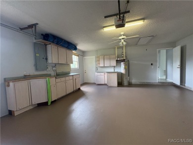 Long driveway and a majestic oak tree lead to this 3 bedroom 2 on Sugarmill Woods Golf and Country Club in Florida - for sale on GolfHomes.com, golf home, golf lot