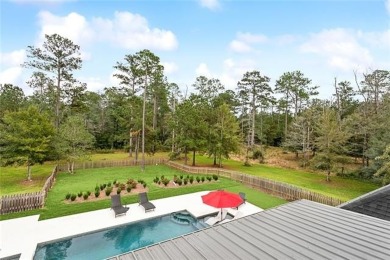 Nestled within the gates of Money Hill, this stunning two-story on Money Hill Golf and Country Club in Louisiana - for sale on GolfHomes.com, golf home, golf lot